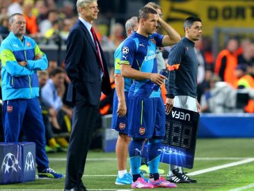 Arsene Wenger (L) i Lukas Podolski