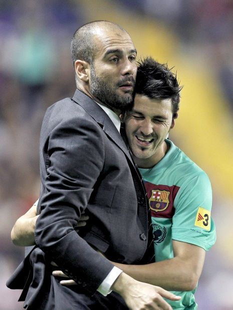 David Villa i Josep Guardiola cieszą się z tytułu