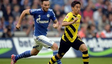 Marco Hoeger (L) i Shinji Kagawa (fot. Getty Images)